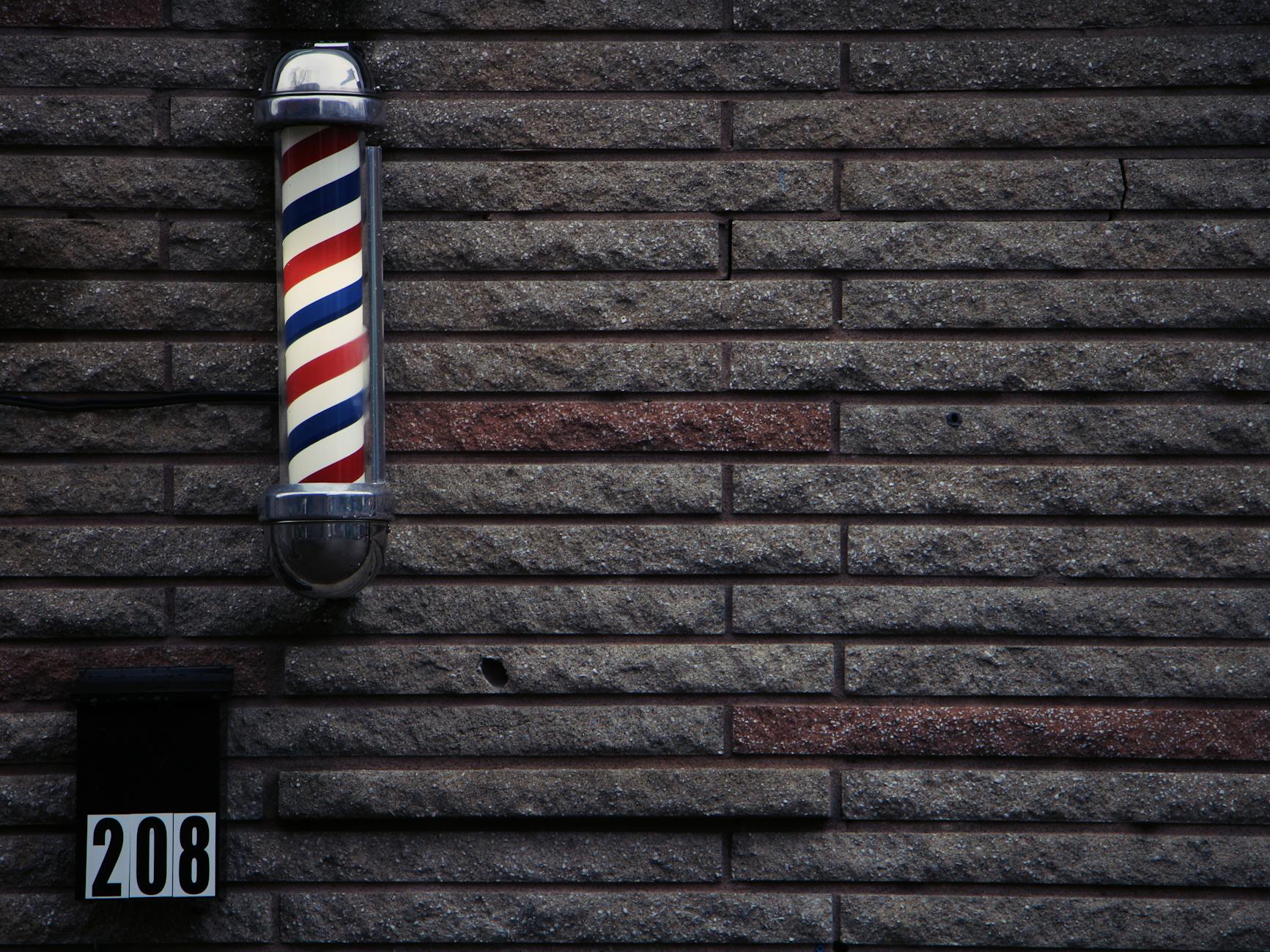 Classic barber pole with red, white, and blue stripes