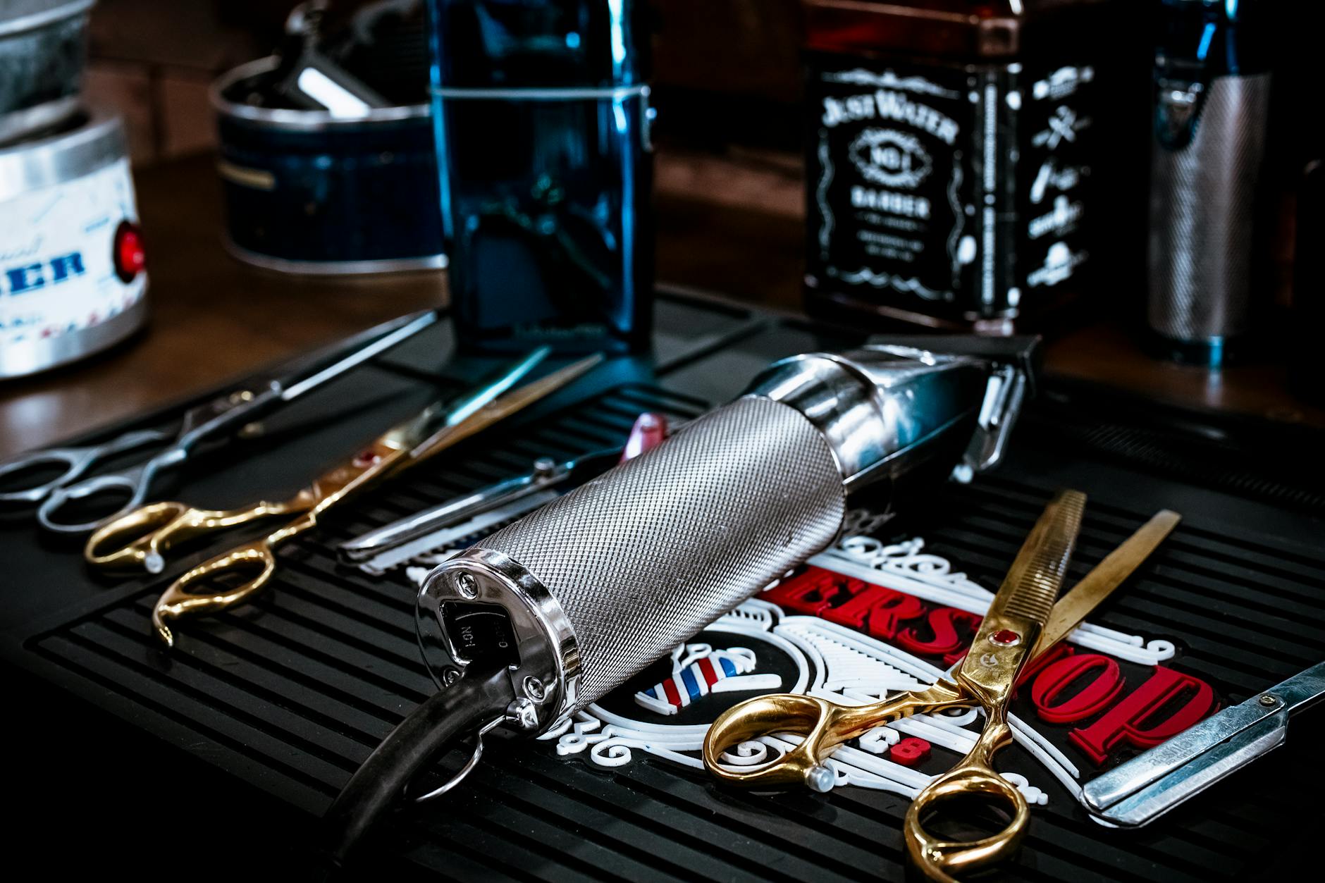 Professional barbershop tools including clippers and scissors